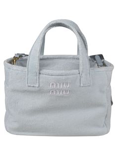 Logo Embossed Top Handle Shopper Bag from Miu Miu | Miu Miu Women's Logo Embossed Top Handle Shopper Bag in Cielo | SS22 Miu Miu Tote Bag For Daily Use, Rectangular Miu Miu Bag, Miu Miu Double Handle Bag For Daily Use, Daily Use Miu Miu Double Handle Bags, Miu Miu Bags With Detachable Double Handle, Miu Miu Rectangular Bag With Removable Pouch, Miu Miu Shoulder Bag With Removable Pouch Top Handle, Miu Miu Shoulder Bag With Top Carry Handle, Miu Miu Designer Top Handle Bag