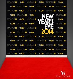 a red carpeted room with a black and yellow new year's eve backdrop