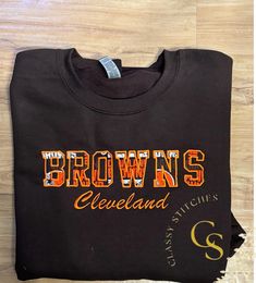 Cleveland Browns  crewneck sweatshirt.  Send me a message if you want a tshirt or hoodie quote.  Will look same as the photo unless you want to change the sweatshirt color to orange, gray, or white. And can change thread color as well. Add a note if you want a different color crewneck or thread color other than what is listed Game Day T-shirt With Embroidered Logo, Game Day Crew Neck T-shirt With Letter Embroidery, Brown Crew Neck Top With Embroidered Logo, Brown Crew Neck Hoodie With Letter Print, Brown Cotton Sweatshirt With Embroidered Logo, Custom Embroidered Crew T-shirt For College, Custom Embroidery Crew T-shirt For College, College Crew T-shirt With Custom Embroidery, Game Day Crew Neck Sweatshirt With Embroidered Text