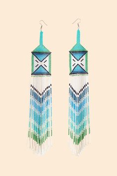 Yawanawa Maxi Beaded Earrings – FARM Rio Traditional Long Drop Beaded Earrings With Dangling Beads, Traditional Long Drop Beaded Earrings, Traditional Handwoven Turquoise Earrings, Artisan Beaded Earrings For Festivals, Traditional Green Beaded Earrings With Large Beads, Traditional Beaded Fringe Earrings For Beach, Traditional Green Handwoven Beaded Earrings, Traditional Beaded Fringe Drop Earrings, Swimwear Dress