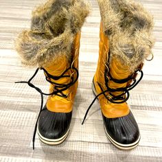 Fabric: Waxed Canvas Faux-Fur Ruff Waterproof Fleece Lining Lace-Up Closure Rubber Sole Yellow Winter Boots For Outdoor Activities, Yellow Boots For Winter Outdoor Activities, Waterproof Yellow Boots For Fall, Yellow Waterproof Boots For Fall, Yellow Outdoor Boots For Fall, Yellow Insulated Boots For Outdoor, Yellow Insulated Round Toe Boots, Sorel Ankle Duck Boots, Sorel Tall Lace Up Boots