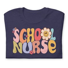 a t - shirt with the words school nurse in colorful letters and flowers on it