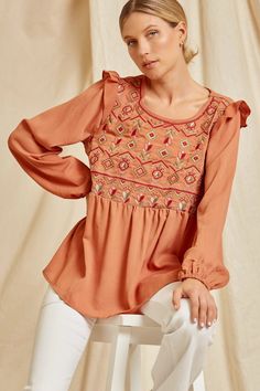 Add some whimsy to your wardrobe with our Babydoll Ruffle Embroidered Top! This lightweight and trendy piece features delicate embroidery and a sweet babydoll silhouette. Perfect for any casual occasion, this top is both cute and versatile. A must-have for your closet! This top features a round neckline, ruffle detailing on the shoulders, pretty embroidery, long sleeves with elastic at the wrist and a relaxed babydoll silhouette. Small Bust 38" Length 26" : Medium Bust 40" Length 26" Large Bust Graffiti V, Pretty Embroidery, Delicate Embroidery, Kimono Jacket, Large Bust, Embroidered Top, Small Bust, Round Neckline, Baby Dolls