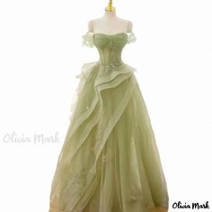 Olivia Mark - Bandeau Strap Evening Gown with Waist-Cinching Netted Tulle Detail - Cocktail Party Dress Green Tulle Ball Gown For Banquet, Green Tulle Ball Gown For Banquets, Green Tulle Evening Dress With Ruffles, Fitted Green Organza Ball Gown, Green Organza Evening Dress For Prom, Green Organza Ball Gown, Green Tulle Formal Ball Gown, Green Organza Ball Gown Evening Dress, Green Tulle Floor-length Evening Dress