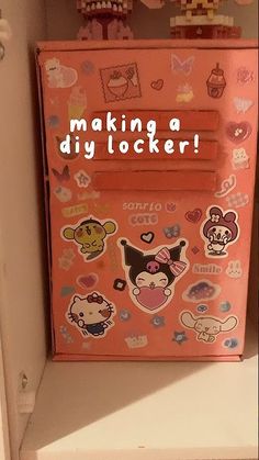 a pink refrigerator covered in lots of stickers