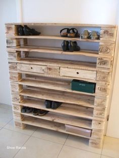 the shoe rack is made out of wooden pallets