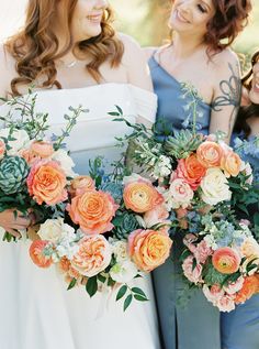 the bridesmaids are holding their bouquets together