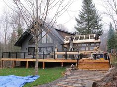 a house that is next to some trees