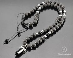 "Men's Necklace Black Onyx Lava Boho Long Adjustable Protection Yoga Mala Gemstone Hematite Beaded Necklace Gift For Him Mother's Day Gift Free fast shipping 3-5 business days delivered to the purchaser all necklaces -ALL THE PRODUCTS AT ELISAJEWELRYART ARE HANDMADE AND MADE WITH NATURAL BEADS. -WHAT DOES THE ONYX STAND FOR A powerful protection stone, Black Onyx absorbs and transforms negative energy, and helps to prevent the drain of personal energy. Black Onyx aids the development of emotiona Black Beaded Stone Necklaces For Gifts, Black Beaded Necklaces With Stones As Gift, Black Beaded Necklace With Stones, Black Crystal Necklaces With Stones As A Gift, Black Crystal Necklaces With Stones For Gift, Black Lava Stone Bohemian Jewelry, Bohemian Black Lava Stone Jewelry, Black Lava Stone Round Bead Necklaces, Black Lava Stone Necklace Spiritual Style