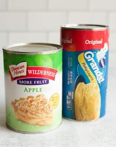 two canned food items sitting next to each other