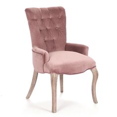 an upholstered pink velvet chair with wooden legs and buttoned back, viewed from the front