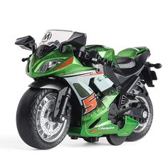 a green toy motorcycle on a white background