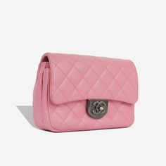 The Double Carry flap bag from Chanel is an absolute vision. Crafted from pink calfskin leather with ruthenium tone hardware, this perfect little piece is definitely hard to get your hands on. The double carry means it can be  as a shoulder bag or across the body, making this piece functional and versatile.  SPL Exterior  Pink Quilted Calfskin Leather   Ruthenium tone hardware Single flap Interwoven chain / leather strap  Detachable chain with padlock feature 3 D ring attachments for strap CC twist-lock clasp Slip pocket at rear Excellent condition - a small mark to front flap and base. Some light creasing which is natural to the leather type.  Serial Code 21XXXXXX - Year of Production 2015/2016  Interior  Black fabric interior  Single compartment Large slip pocket at the front under flap Dior Shoes, Hard To Get, Timeless Handbag, Leather Chain, Exclusive Bag, Flap Bag, Pink Leather, Chanel Handbags, Leather Mini