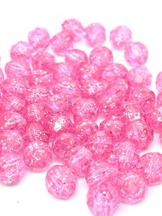 pink crystal beads on white background