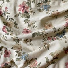 an image of a flowered fabric that is very soft and draping up