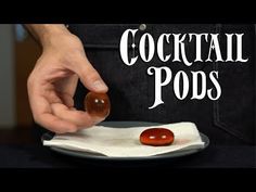 a person is holding some food on a plate with the words cocktail pops in front of them