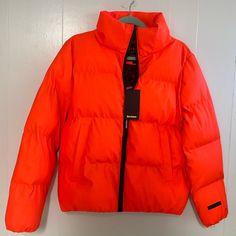 Nwt Minor Flaw (Stain Near Collar) *Pictured Small Neon Orange Juicy Couture Puffer Jacket Orange Hooded Outerwear For Spring, Orange Streetwear Outerwear For Fall, Casual Orange Nylon Outerwear, Orange Outerwear For Fall Streetwear, Orange Outerwear For Streetwear In Fall, Trendy Orange Long Sleeve Outerwear, Orange Nylon Outerwear For Fall, Trendy Orange Outerwear With Pockets, Trendy Orange Outerwear