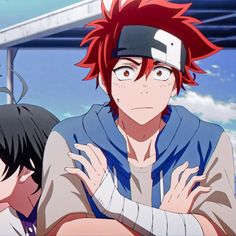 two anime characters one with red hair and the other without his headband, are looking at something