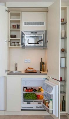 an open refrigerator with food inside of it