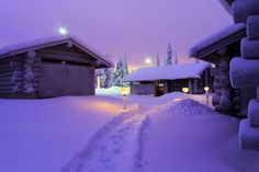 the snow is piled on top of the houses