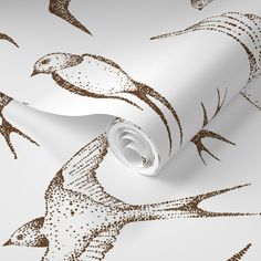 a white and brown bird wallpaper with metallic foiling on it's side