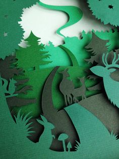 paper cut deer in the woods with trees