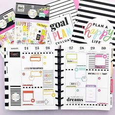 an open planner book with lots of stickers on it