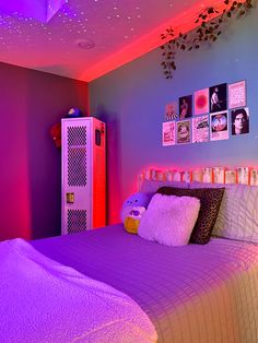 a bed room with a neatly made bed and purple lighting