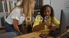 Tired Woman In Yellow Shirt Leans On Desk As Another Woman In White Shirt A.. Tired Woman, Leaning Desk, Woman In White, White Desk, Yellow Shirt, Yellow Shirts, White Shirt, Desk