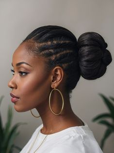 41 Sleek Bun Hairstyles for Black Women: A Style Guide Bun Extensions Black Women, Sleek High Bun Black Women, Black Women Sleek Bun, Professional Bun Hairstyles Black Women, Black Woman French Roll