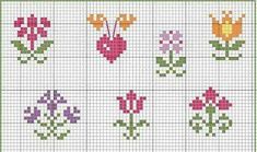 a cross stitch pattern with flowers in different colors and sizes on the bottom half of it