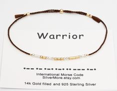 "WARRIOR morse code bracelets with tiny precious metal beads representing dots and dashes is a great gift. The tiny dots and dashes beads are secured to the bracelet with two tiny beads at both ends so they do not slide around. A delicate everyday bracelet, safe to be wet while washing or showering. It can be worn alone or layered.  This Listing is for one bracelet  [ DETAILS ] * 100% Natural, High-quality silk cords * 100% Sterling Silver, 14k Gold Filled, or Rose Gold Filled * Beads (dots and Warrior Code, Morse Code Bracelets, Code Bracelets, Code Morse, Everyday Bracelet, Morse Code Bracelet, Tiny Beads, Natural High, Morse Code