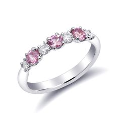 This half studded band has been set with pink sapphires and diamonds in calibrated sizes. 18k white gold holds each gem in a secure prong setting. The light pink tones are currently a trending color like the pastel colors of Rose Quartz. The perfect ring for your fashionista fiancé set with 0.57 carats of pink sapphires. Order online info@jupitergem.com Fine Jewelry Pink Diamond Ring In Platinum, Pink Half Eternity Diamond Ring, Pink Cubic Zirconia Half Eternity Rings, Pink Round Sapphire Ring With Diamond Accents, Pink Sapphire Ring With Brilliant Cut In Platinum, Pink Brilliant Cut Sapphire Ring In Platinum, Pink Diamond Ring With Prong Setting, Pink Diamond Ring With Single Cut Diamonds, Round Pink Sapphire Ring With Diamond Accents