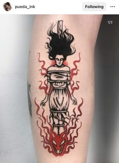 a tattoo on the leg of a person with a black and red fire behind her