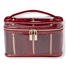 a red suitcase with gold zippers on the front and sides, it is empty