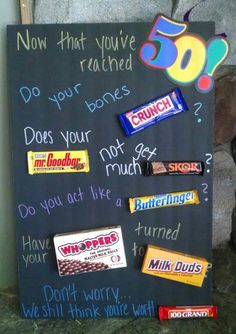 a chalk board with some candy on it