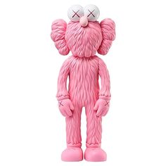 a pink teddy bear with big ears and two eyes on it's face, standing upright