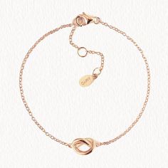 description This dainty bracelet is minimal and elegant. Beautifully packaged with our signature box. end description materials Colors in: .925 Sterling Silver / Gold Vermeil / Rose Gold Vermeil Hypoallergenic, lead and nickel free end materials details Length: 6-7in (15.2-17.8cm) Knot Width 3/8 in (1 cm) x Height 1/4 in (6 mm) Lobster clasp Handcrafted in NYC end details sku #B316 end sku Love Knot Bracelet, Gold Knot Bracelet, Statement Bracelets, Dainty Bracelet, Brides Magazine, Knot Bracelet, Dainty Bracelets, Love Knot, Statement Bracelet