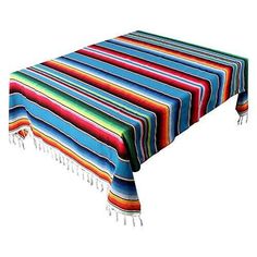 a colorful table cloth with fringes on it