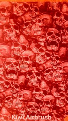 a bunch of skulls that are in the middle of an orange background with words on it