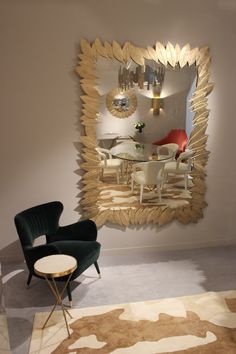 a chair and table in front of a mirror