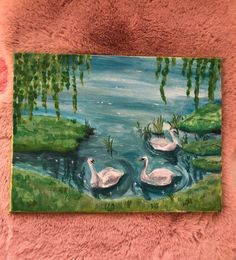 a painting of three swans swimming in a pond