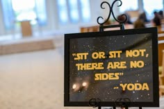 a sign that says sit or sit not there are no sides yoda