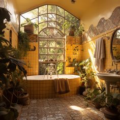 a bath room with a tub a sink and some plants on the wall next to it