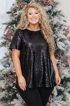 Let your beauty sparkle in this gorgeous top! This top has a classic black color that is perfect for pairing with all your faves this season! The sparkly material and flirty fit is super sweet! Style this top with leather leggings or a cute skirt for an effortlessly chic look!
100% Polyester Black Glitter Tops For Party Season, Black Tops For Festive Party Season, Sparkling Tops For Night Out Holiday, Sparkling Tops For Holiday Night Out, Sparkling Tops For Night Out And Holiday Season, Black Shimmer Tops For Party, Shiny Tops For Night Out And Holiday, Black Sparkling Top For Party, Glamorous Black Top For Festive Occasions