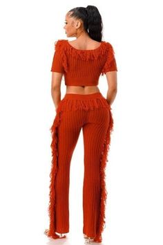 Elevate your style with our "Lets Dance Fringe Set," a captivating ensemble that seamlessly blends comfort and chic. Meticulously crafted, this set is designed to make a bold statement and leave a lasting impression.Key Features:1. Fabric: Indulge in the luxurious feel of our cable knit pants set, expertly crafted from 100% polyester for a cozy and stylish experience.2. Fit: The set includes cable knit pants and a short sleeve fringe crop top for a trendy and coordinated look.3. Color Options: O Cable Knit Pants, Fringe Pants, Fringe Crop Top, Crop Top Set, Fringe Sweater, Let's Dance, Top And Pants Set, Activewear Sets, Lets Dance