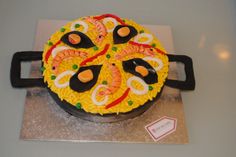 a cake that is shaped like a pizza