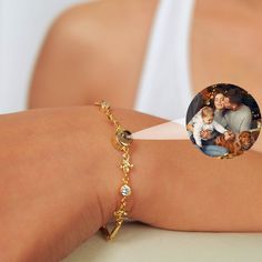 Projection Photo Bracelet Your first date, first kiss, or first vacation together: no matter what picture connects you, keep it in your heart every day with this personalized photo bracelet. Just peek inside the stone or hold the photo stone up to your phone camera to see the image inside. DETAIL * Please hold on the chain and hang it up to a lighted window, put it very close to your eyes and peek inside.  * Material: 925 Sterling Silver / Copper * Color: Silver, Gold, Rose Gold * Projection bead: 6 mm * Chain length: 17 + 5 cm (enter your size in the box if it doesn't fit) * Personalisation: Any photo * If there are some bubbles inside the pendant, please try to clean the back side (flat side) with tissue. Please do not hesitate to contact me. PRODUCTION TIME * All our products are made t Jewelry With Picture Inside, Light Up Pictures, Picture Bracelet, Bracelet Photo, Picture Jewelry, Jewelry Personalized, Phone Camera, Jewelry Picture, Personalized Gifts For Her