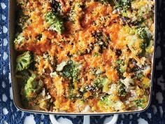 a casserole dish with broccoli and cheese