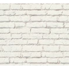 a white brick wall textured with cement